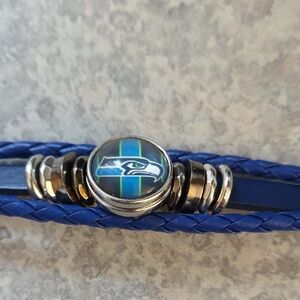 Blue Leather Bracelet with Seattle Seahawks Snap Logo.